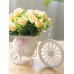 أزهار صناعية زخرفية للمنزل جميلة وطازجة مع سلّة حفظ شكل دراجة