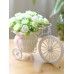 أزهار صناعية زخرفية للمنزل روعة مع سلّة شكل دراجة