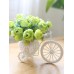 أزهار صناعية زخرفية للمنزل روعة مع سلّة شكل دراجة