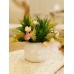 أزهار صناعية زخرفية بألوان مشعّة مع زهريّة ستايل ريف أوروبي