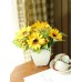أزهار عباد الشمس الأصطناعية مع مزهرية من البورسلان الأبيض ذات التصميم الراقي