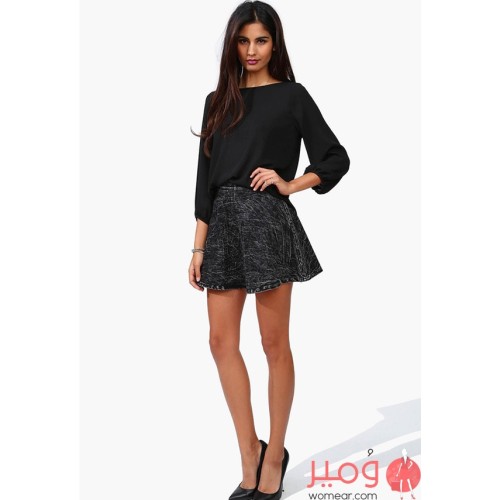 بلوزة أنيقة أكمام طويلة مزينة بلون جلد الفهد فى خلف التصميم 