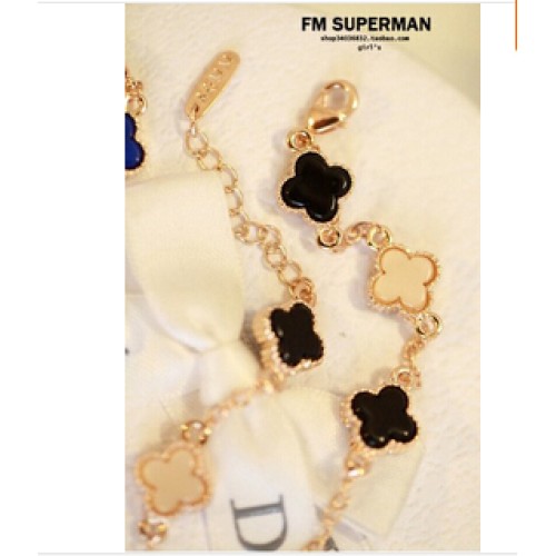 سوار بلون ذهبى بشكل ورود سوداء 