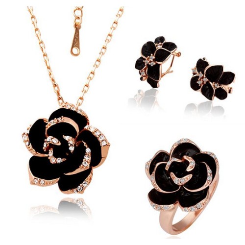 طقم (عقد بقلادة وخاتم بشكل وردة وأقراط دبوسية) 